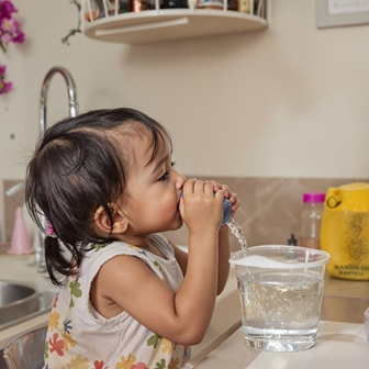 child drinking water